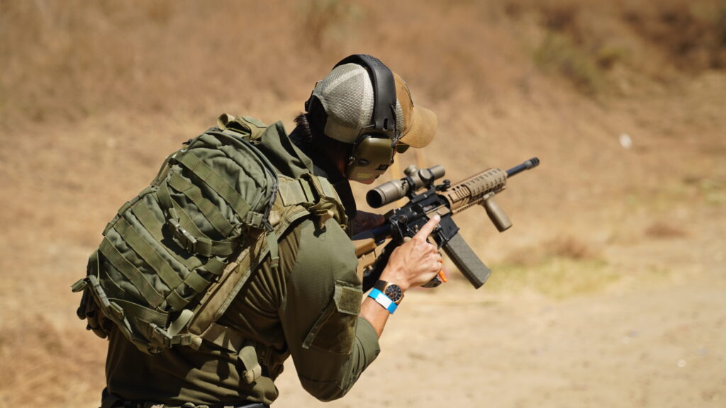 A person using a firearm,